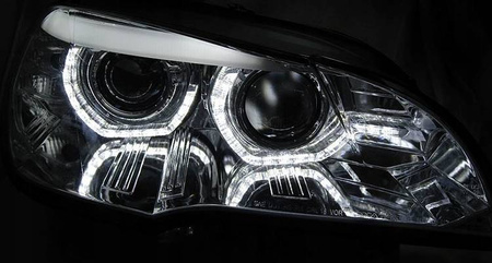 Strålkastare nya BMW X5 E70 07-10 RINGS 3D DRL CHR XENON AFS