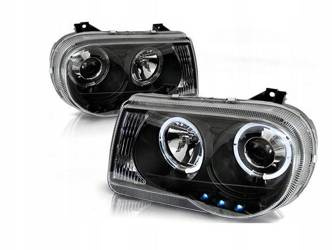 Strålkastare Chrysler 300c 05- linser ringi svart